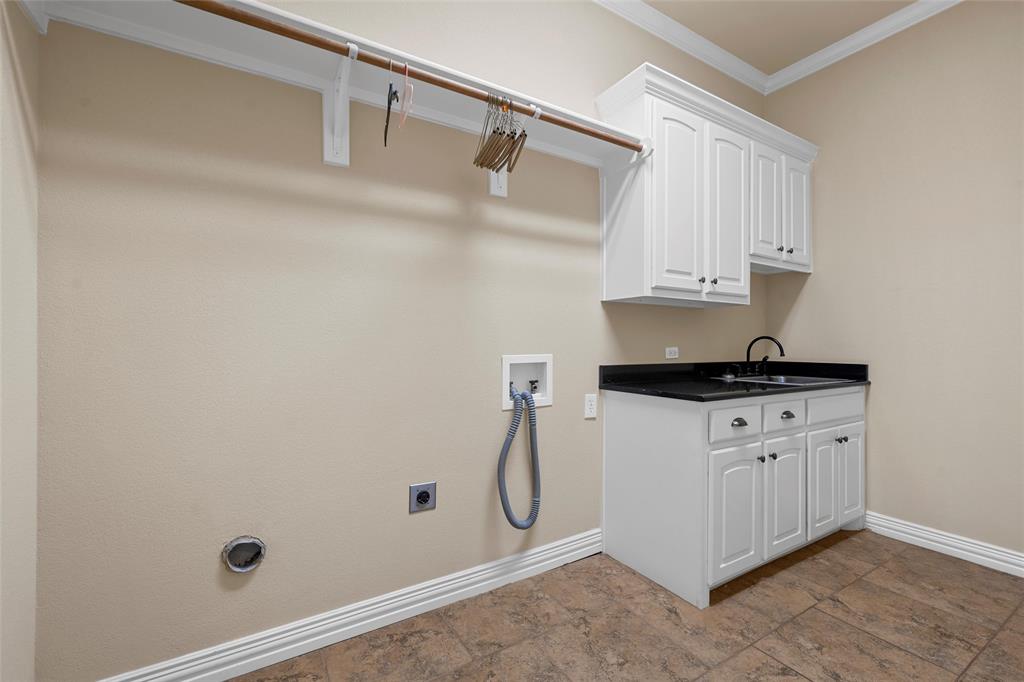 7030 Flagstone Circle Waco, TX 76657 - Photo 22 of 40 a bathroom with a granite countertop sink