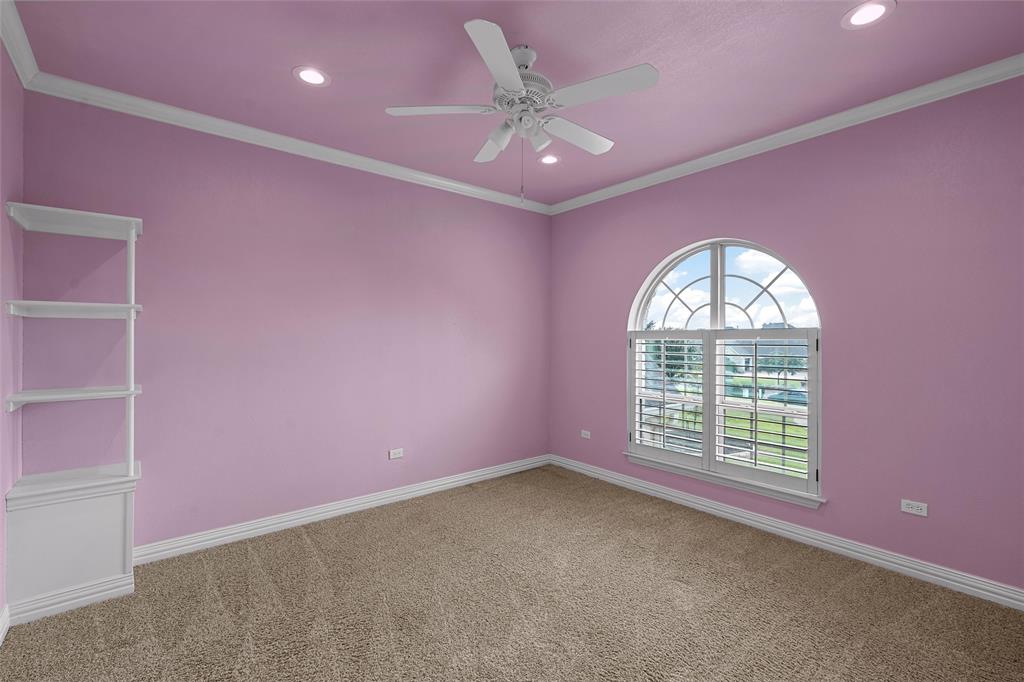 7030 Flagstone Circle Waco, TX 76657 - Photo 34 of 40 an empty room with windows and fan