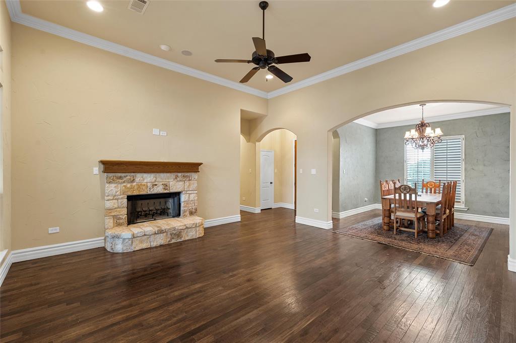 7030 Flagstone Circle Waco, TX 76657 - Photo 6 of 40 a living room with furniture and a fireplace