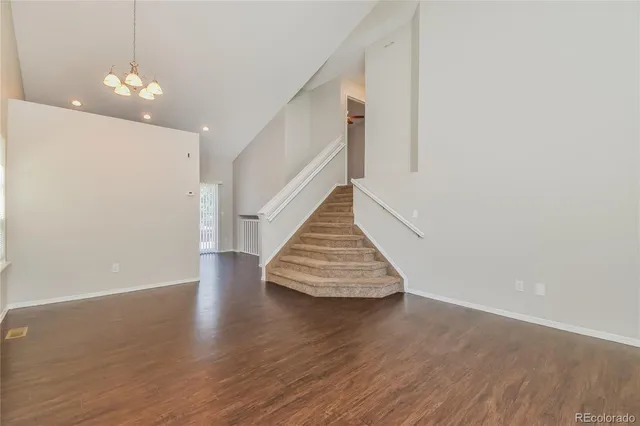 a view of entryway with wooden floor