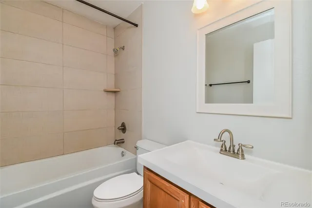 a bathroom with a sink toilet and a bathtub