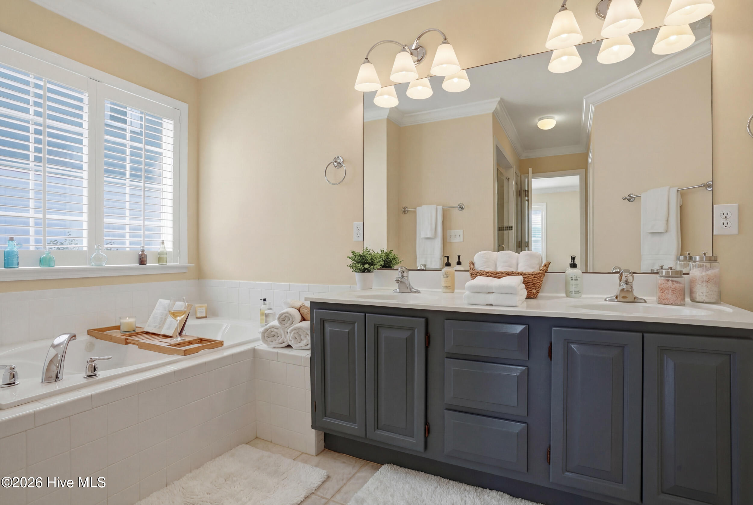 718 Sloop Pointe Lane Kure Beach, NC 28449 - Photo 22 of 70 Primary Bathroom with soaker tub and dual vanity's