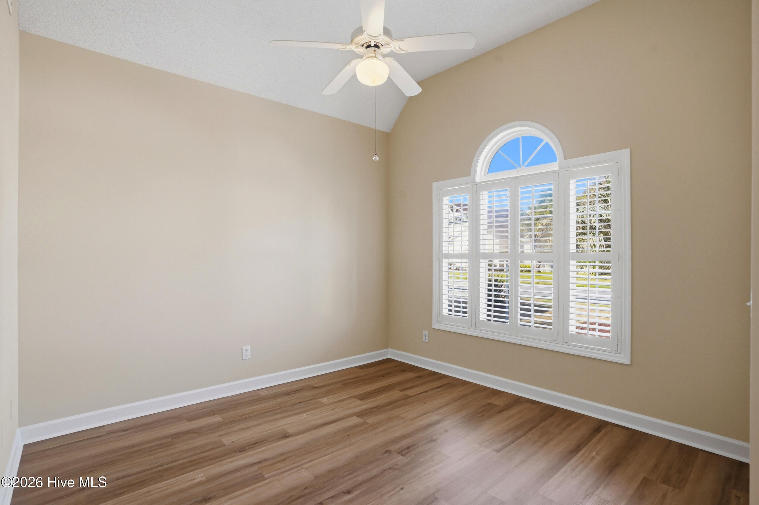 718 Sloop Pointe Lane Kure Beach, NC 28449 - Photo 27 of 70 Guest bedroom with vauled ceilings