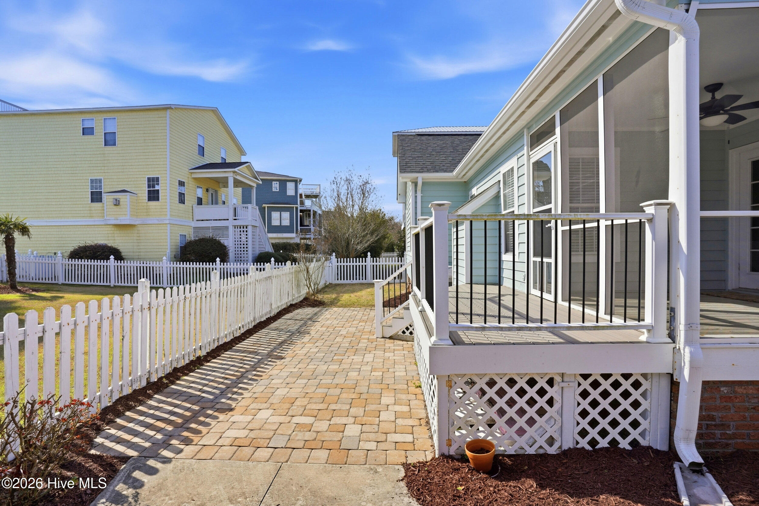 718 Sloop Pointe Lane Kure Beach, NC 28449 - Photo 41 of 70 Addational Open back deck. Pavers, low maintenance back yard.