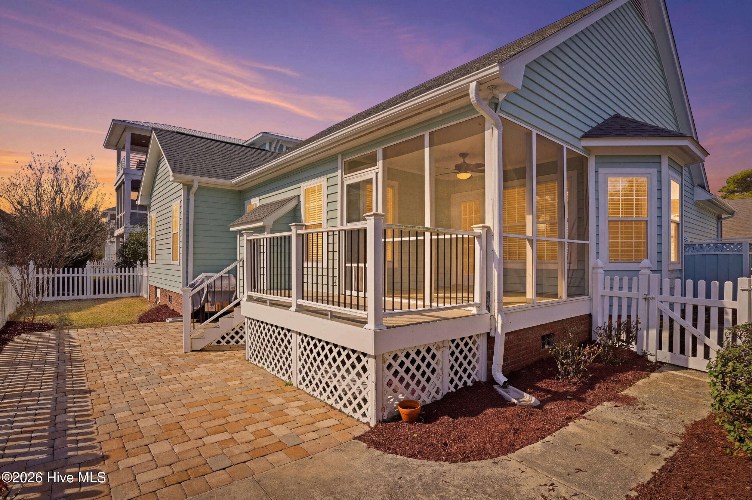 718 Sloop Pointe Lane Kure Beach, NC 28449 - Photo 42 of 70 Addational Open back deck. Pavers, low maintenance back yard.