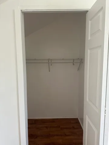 a view of small space with racks on the wall