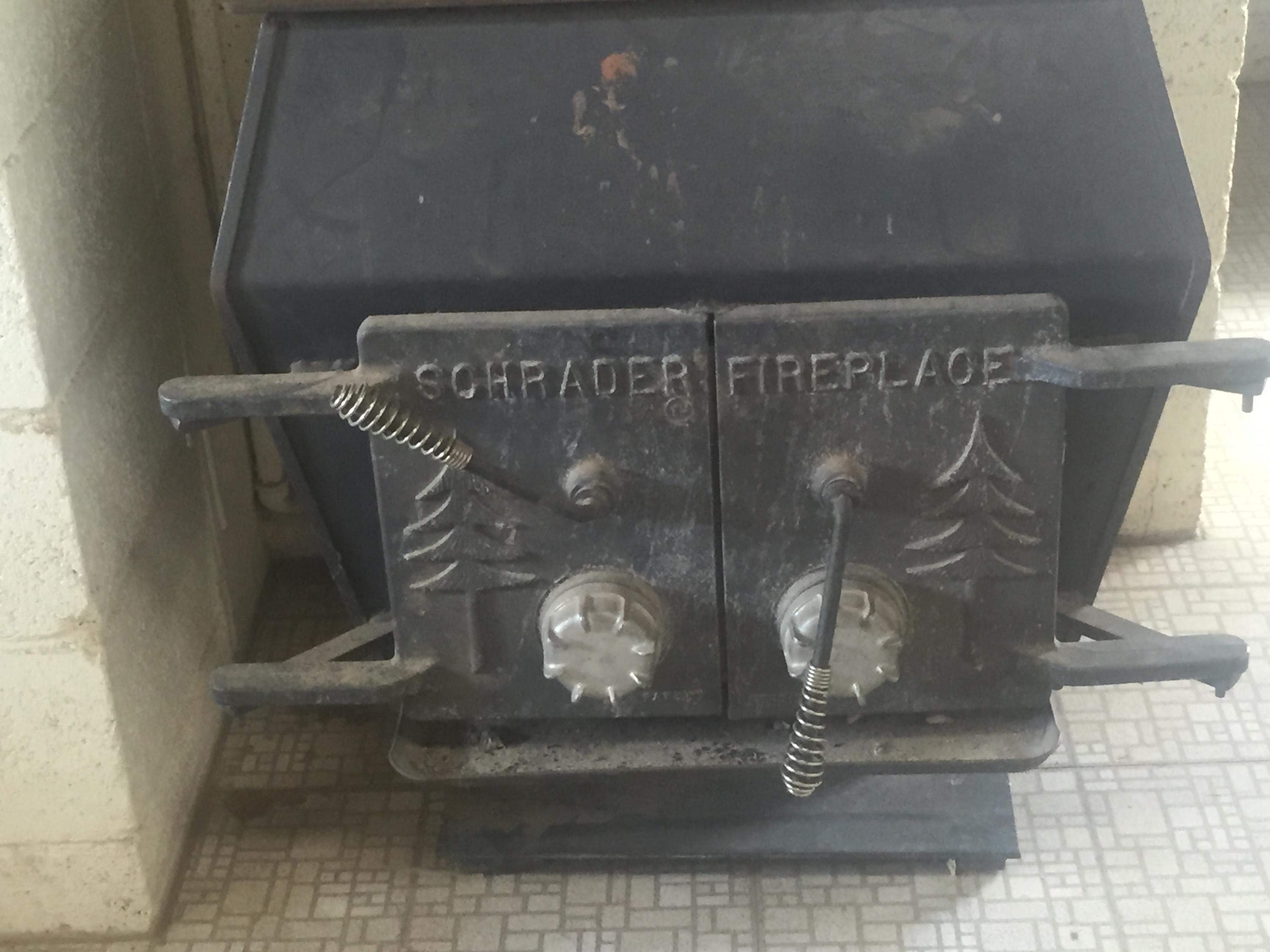 19997 Loop Street Anderson, CA 96007 - Photo 23 of 28 Wood stove in shop