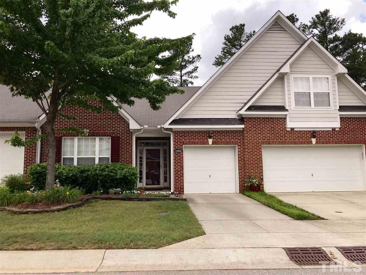 10465 Dapping Drive Raleigh, NC 27614 - Photo 1 of 19 a front view of a house with a yard and garage
