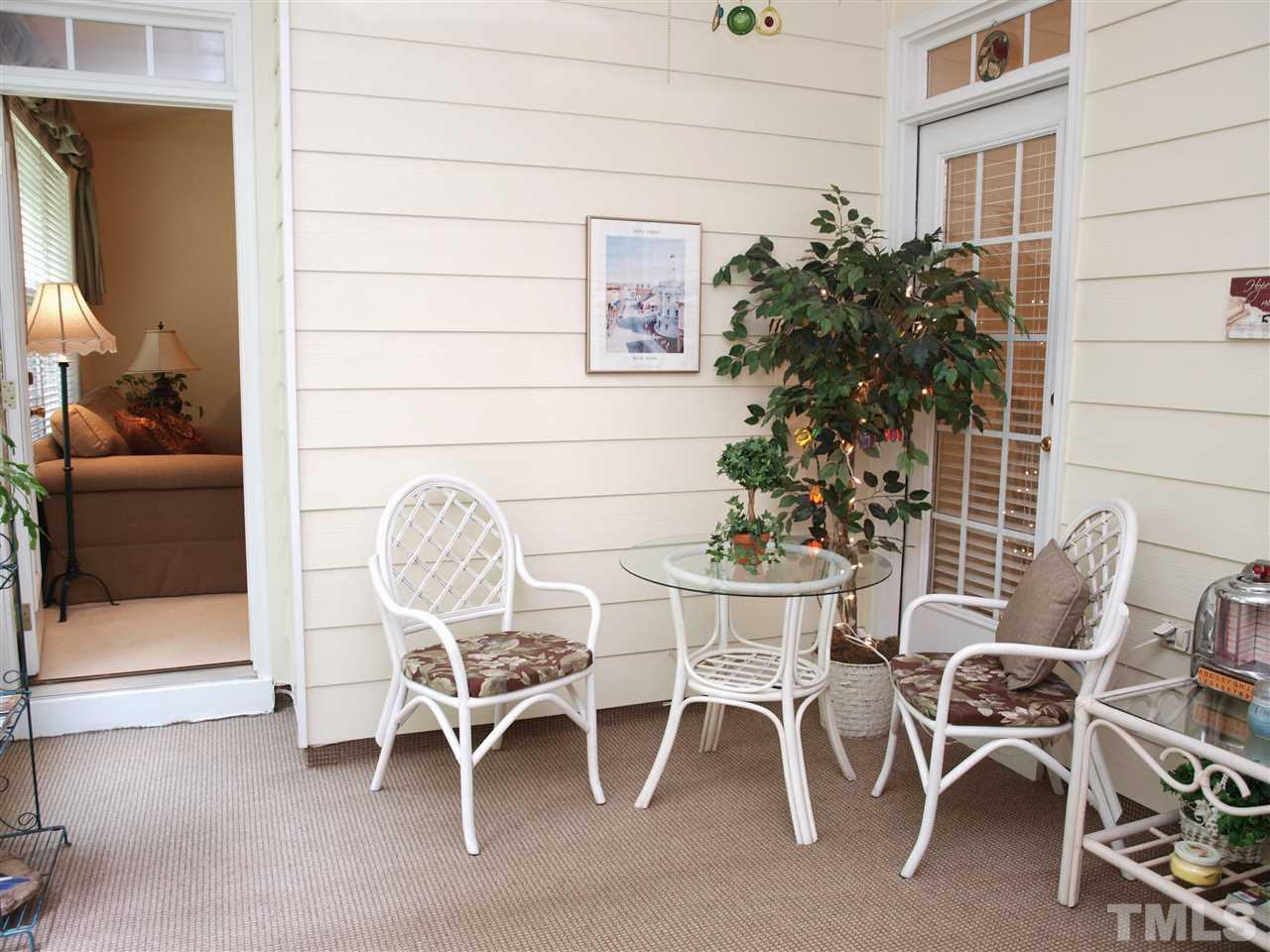 10465 Dapping Drive Raleigh, NC 27614 - Photo 16 of 19 a dining room with furniture and wooden floor