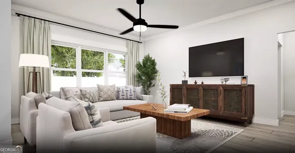 a living room with furniture and a flat screen tv