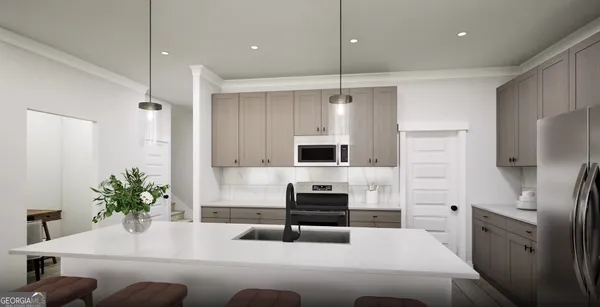 a kitchen with granite countertop a refrigerator a sink a stove and chairs