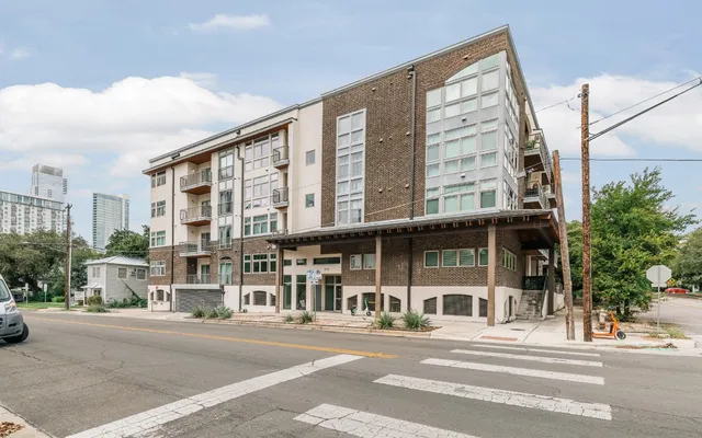 a front view of a building and a street