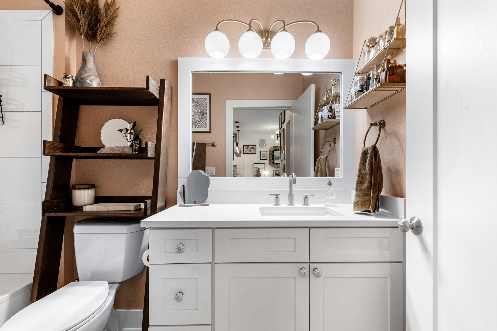 908 Nueces Street, Unit 24 Austin, TX 78701 - Photo 33 of 39 Well-appointed bathroom offering a custom light fixture and ample storage.