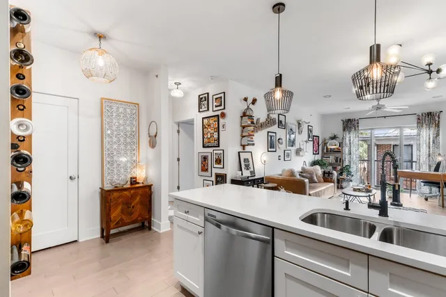 a view of a center island and living room