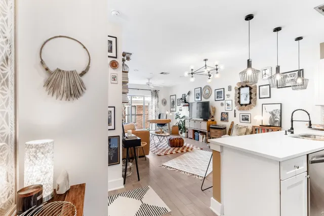 a very nice looking room with lots of furniture and a chandelier