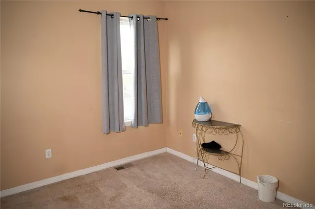 a view of a dinning room with furniture
