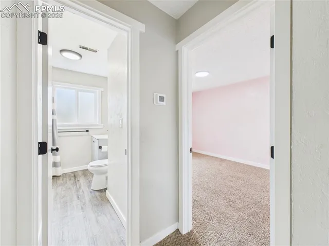 a view of a bathroom with a toilet sink