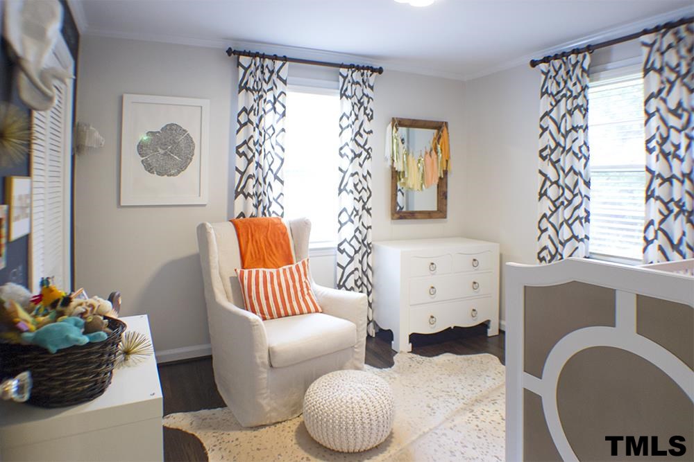 2216 Alexander Road Raleigh, NC 27608 - Photo 10 of 24 a living room with furniture and decor
