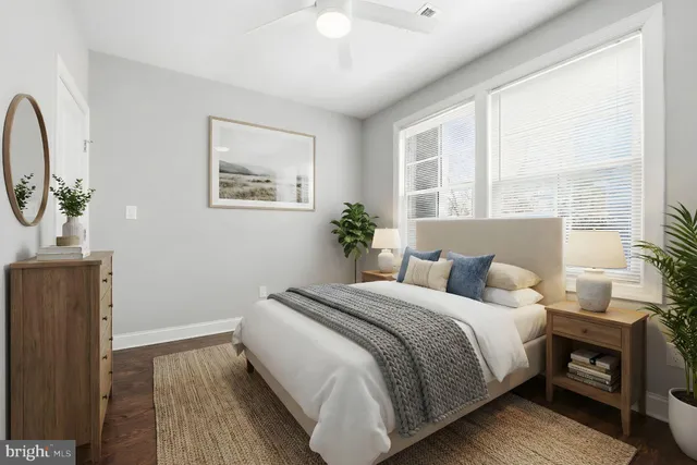 a bedroom with bed and a window