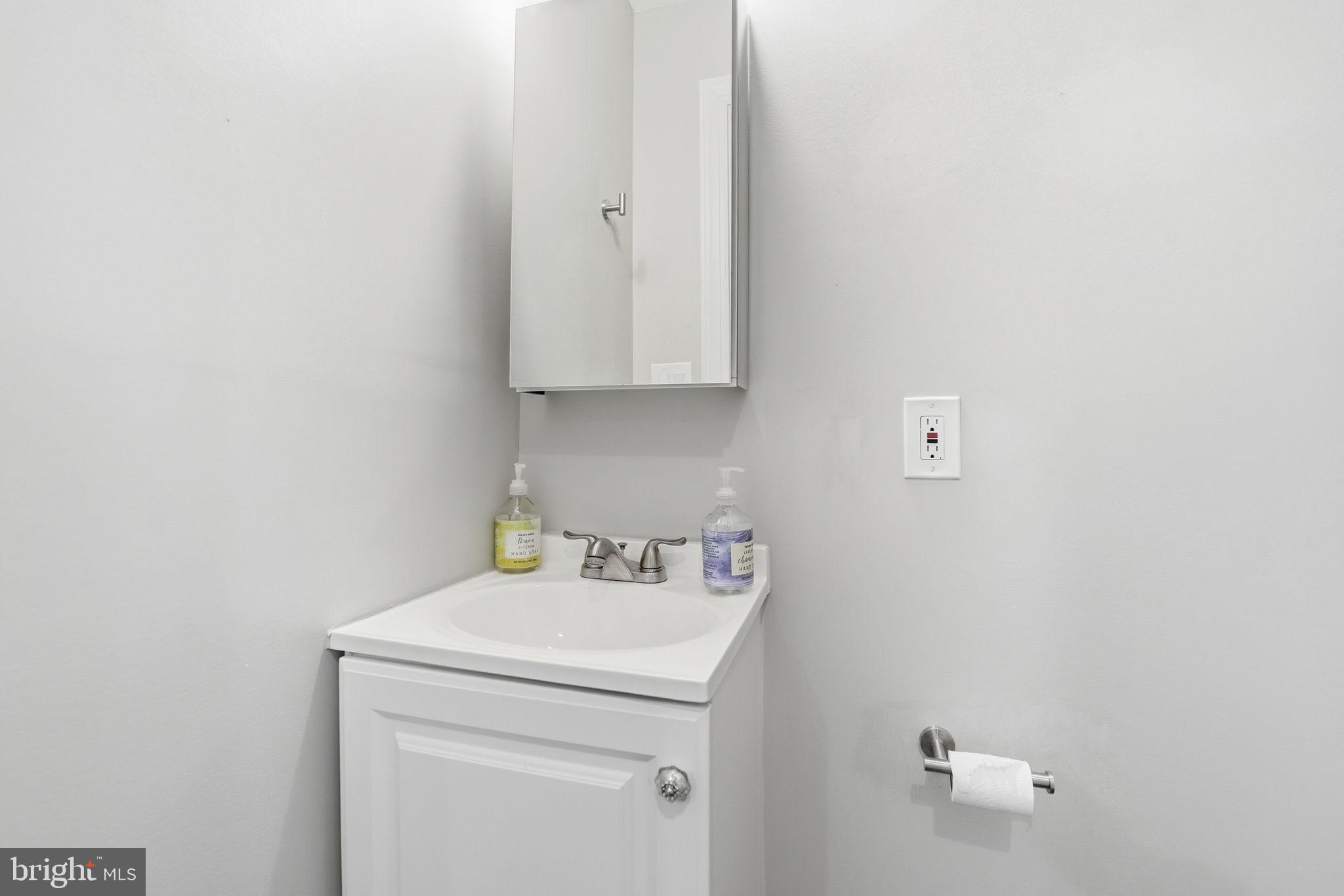 1018 13th Street Southeast, Unit 2 Washington, DC 20003 - Photo 9 of 10 a utility room with dryer and washer