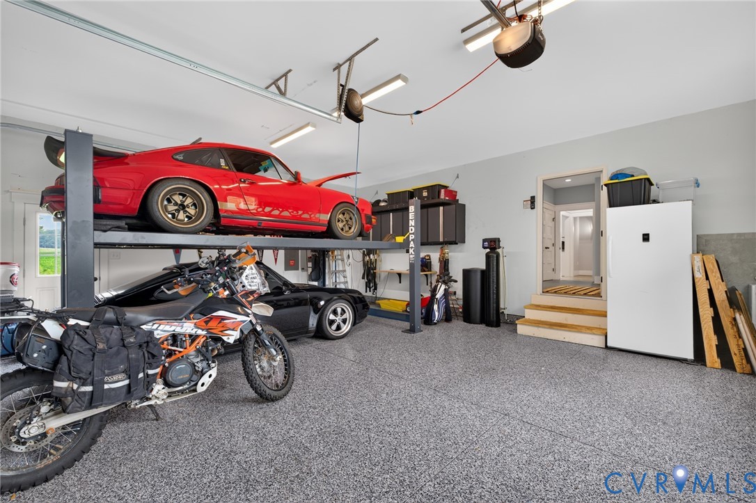 2122 Jockey Ridge Road Maidens, VA 23102 - Photo 61 of 63 Spacious garage featuring a speckled epoxy floor,