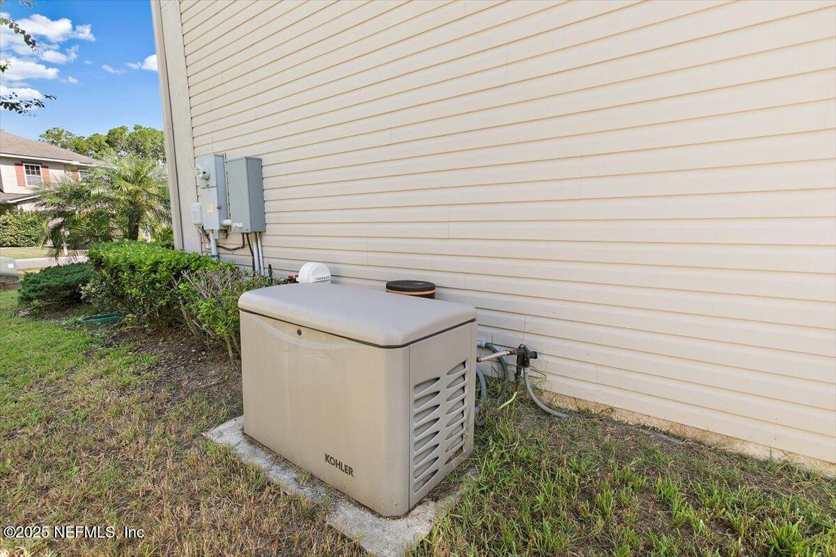 38 Litke Lane St. Augustine, FL 32086 - Photo 15 of 27 a utility room with dryer and washer