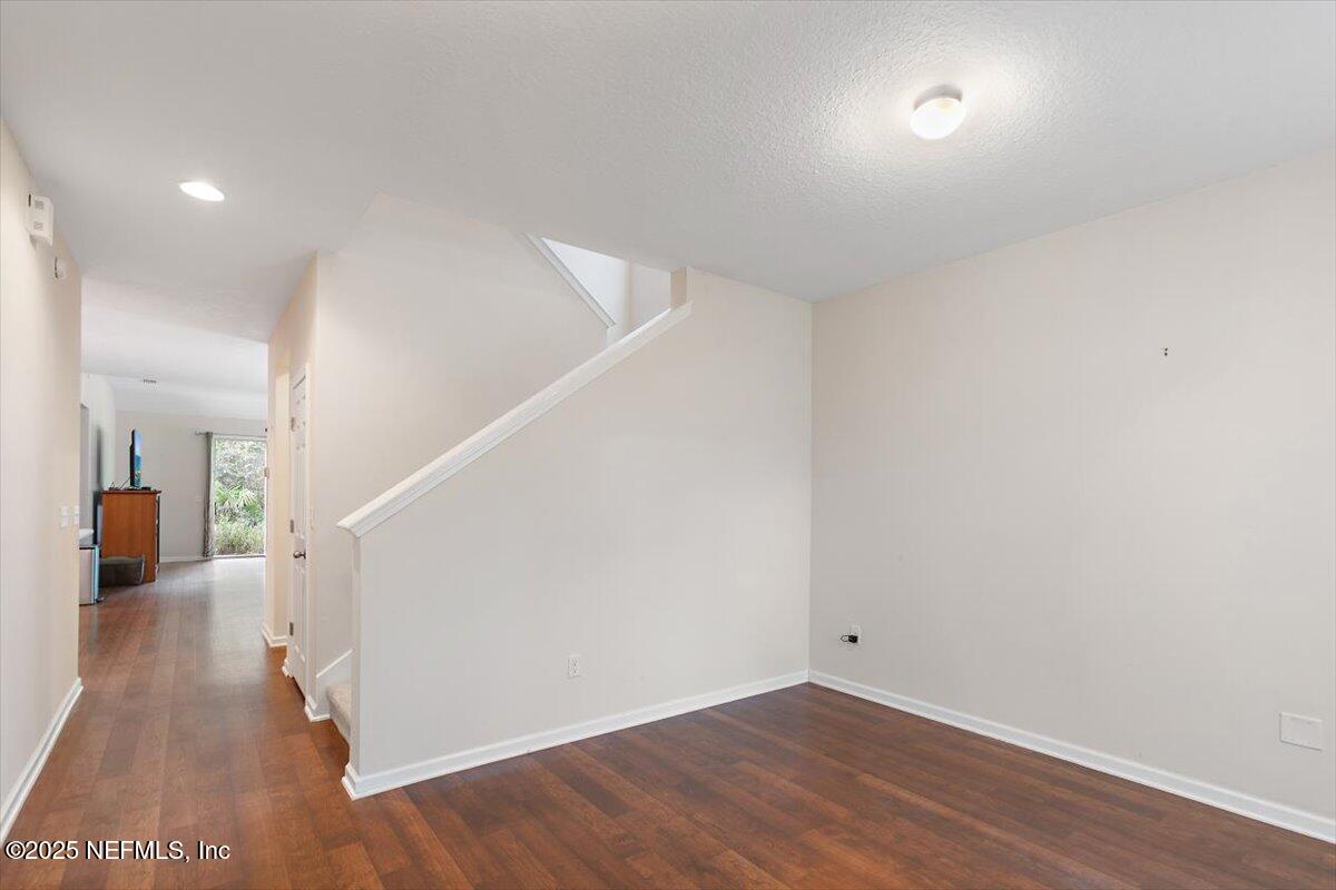 38 Litke Lane St. Augustine, FL 32086 - Photo 18 of 27 a view of a hallway with wooden floor