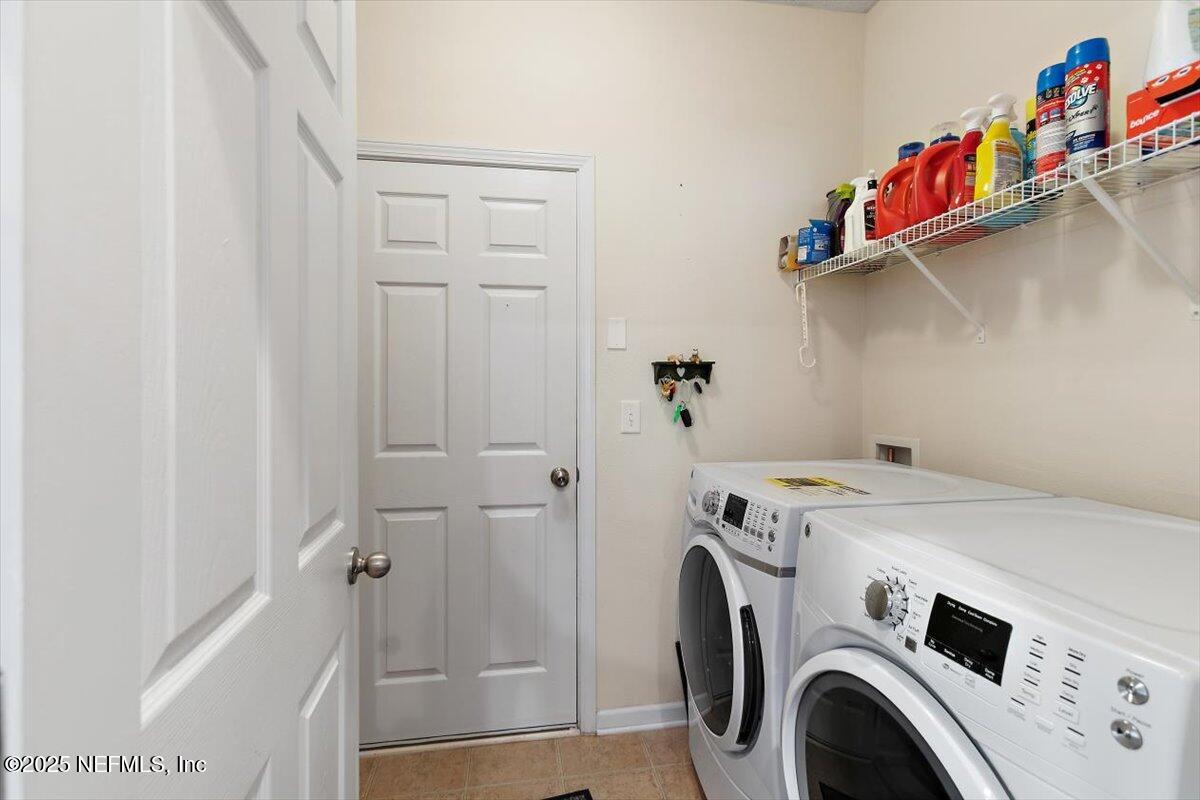 38 Litke Lane St. Augustine, FL 32086 - Photo 6 of 27 a utility room with dryer and washer