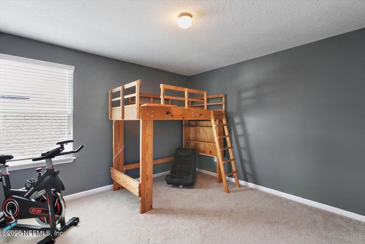38 Litke Lane St. Augustine, FL 32086 - Photo 10 of 27 a view of room with gym equipment