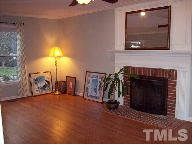 5904 Stable Court Raleigh, NC 27612 - Photo 2 of 16 a view of a livingroom with furniture and a fireplace