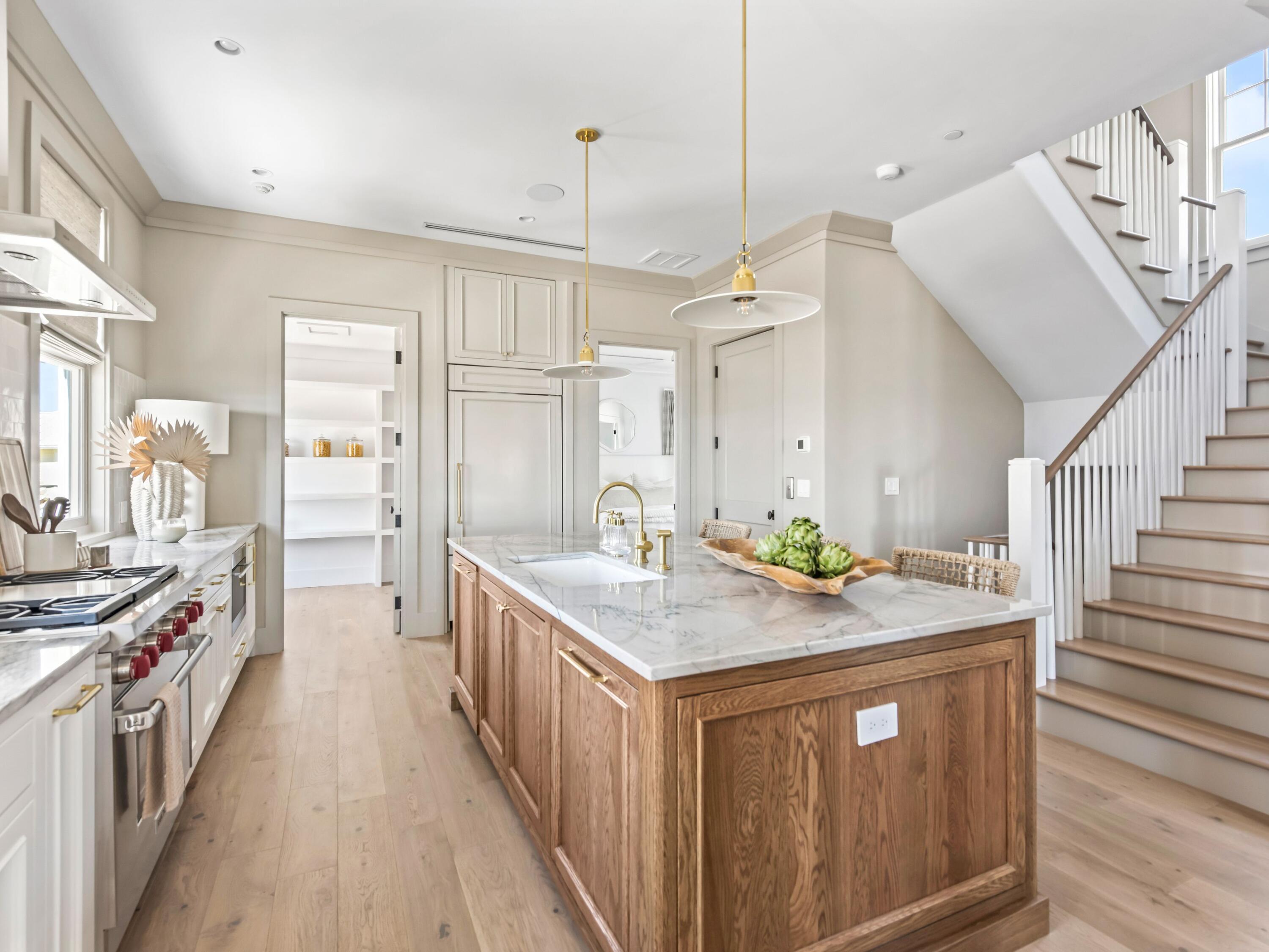 Lot 19 West Lupin Beach Dr Inlet Beach Inlet Beach, FL 32461 - Photo 11 of 57 a kitchen with stainless steel appliances granite countertop a stove and a sink