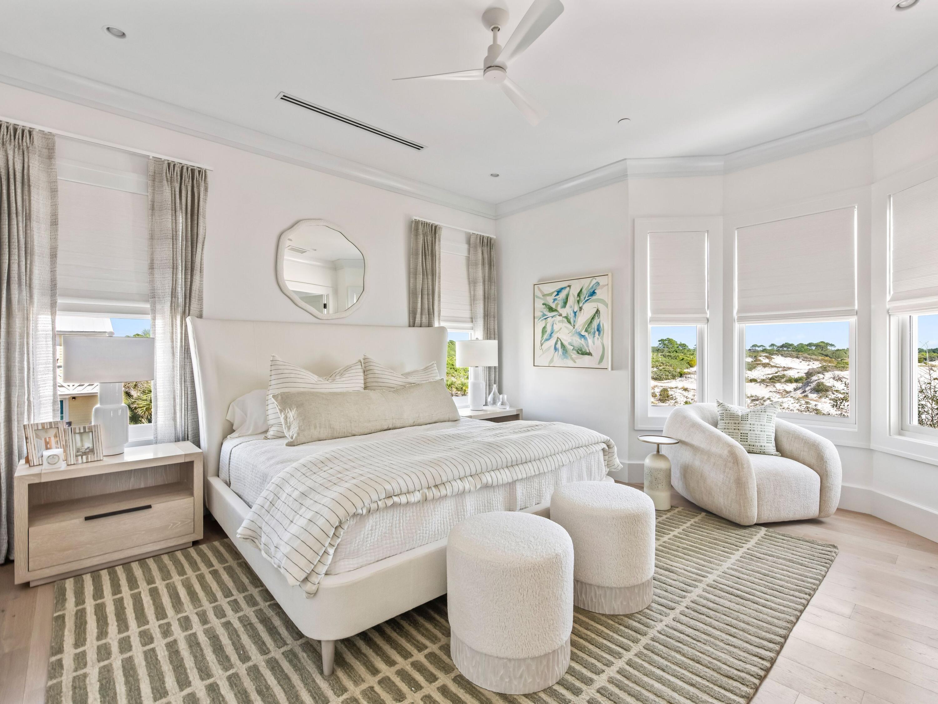 Lot 19 West Lupin Beach Dr Inlet Beach Inlet Beach, FL 32461 - Photo 14 of 57 a bedroom with a large bed and a couch