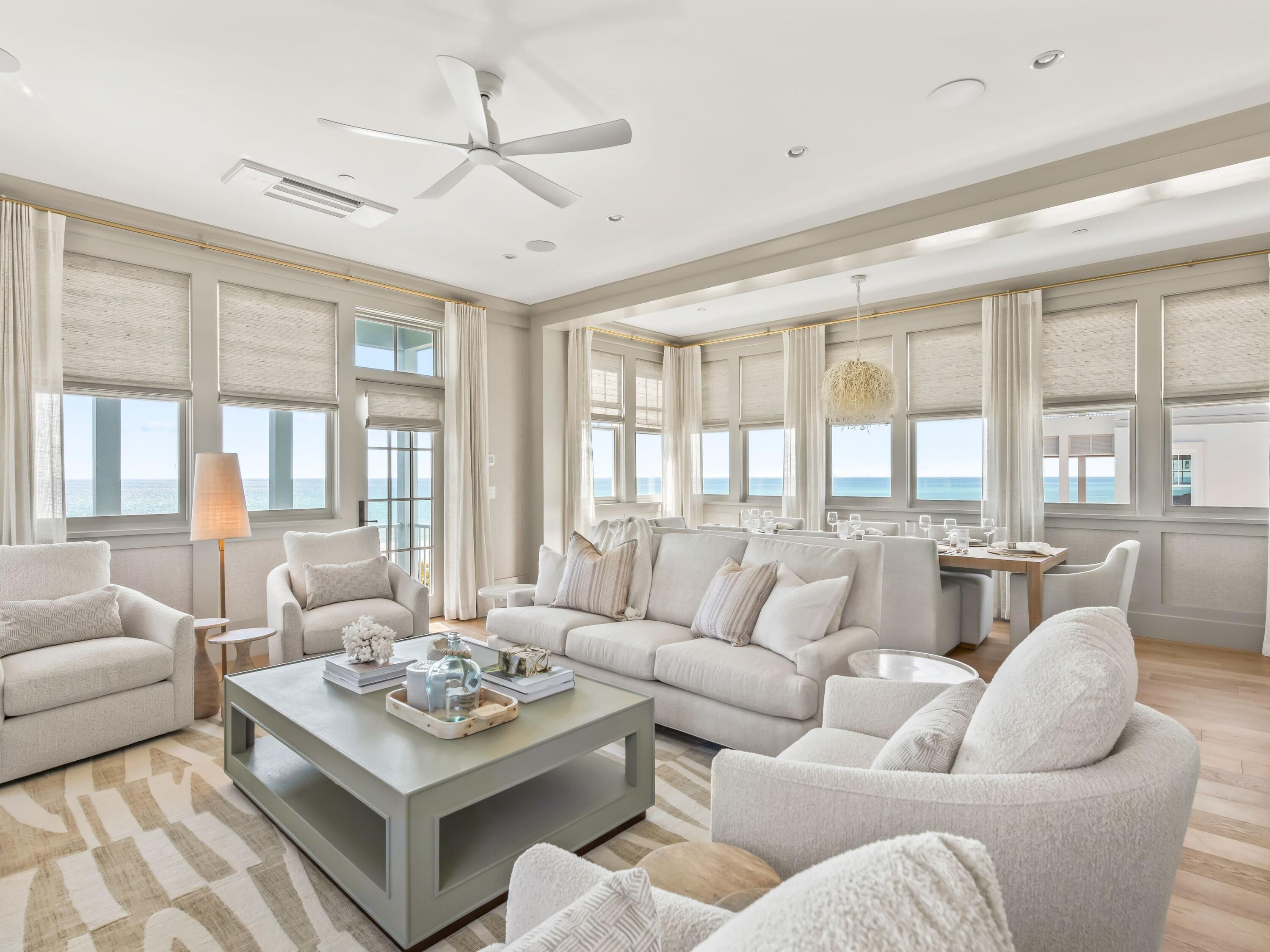 Lot 19 West Lupin Beach Dr Inlet Beach Inlet Beach, FL 32461 - Photo 22 of 57 a living room with furniture a large window and a chandelier