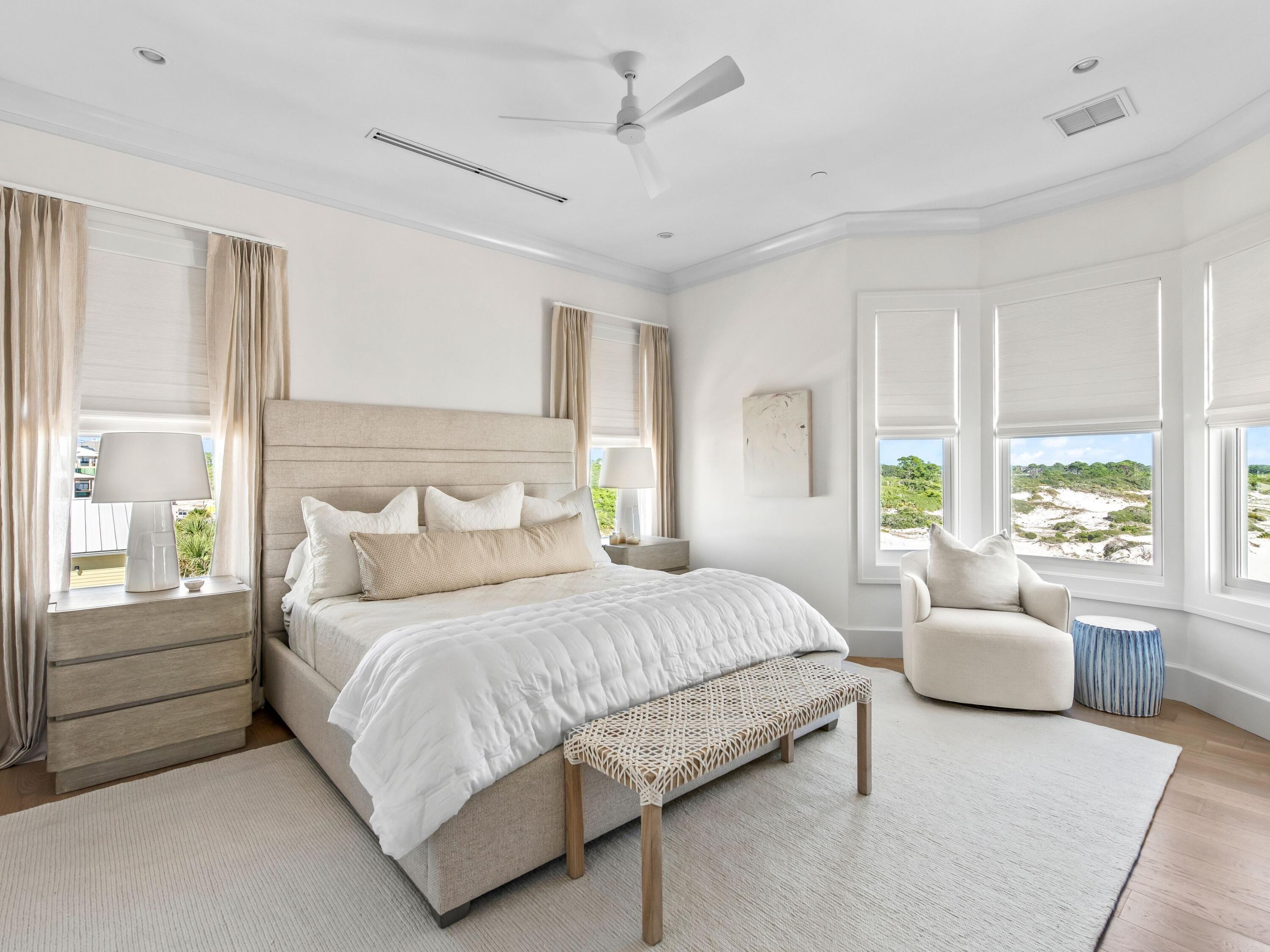 Lot 19 West Lupin Beach Dr Inlet Beach Inlet Beach, FL 32461 - Photo 28 of 57 a bedroom with a large bed couch and windows