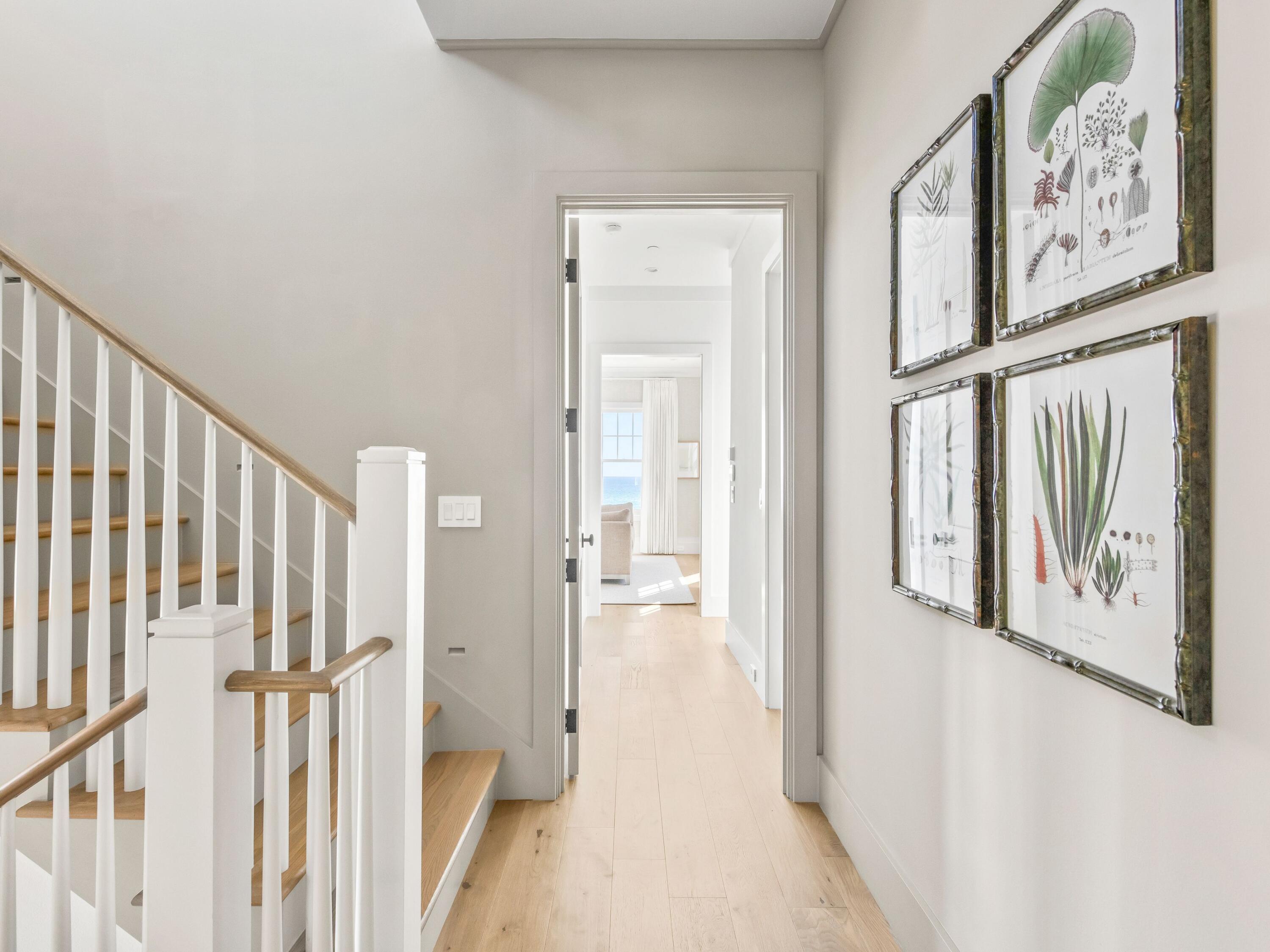 Lot 19 West Lupin Beach Dr Inlet Beach Inlet Beach, FL 32461 - Photo 35 of 57 a view of a hallway with paintings on the wall