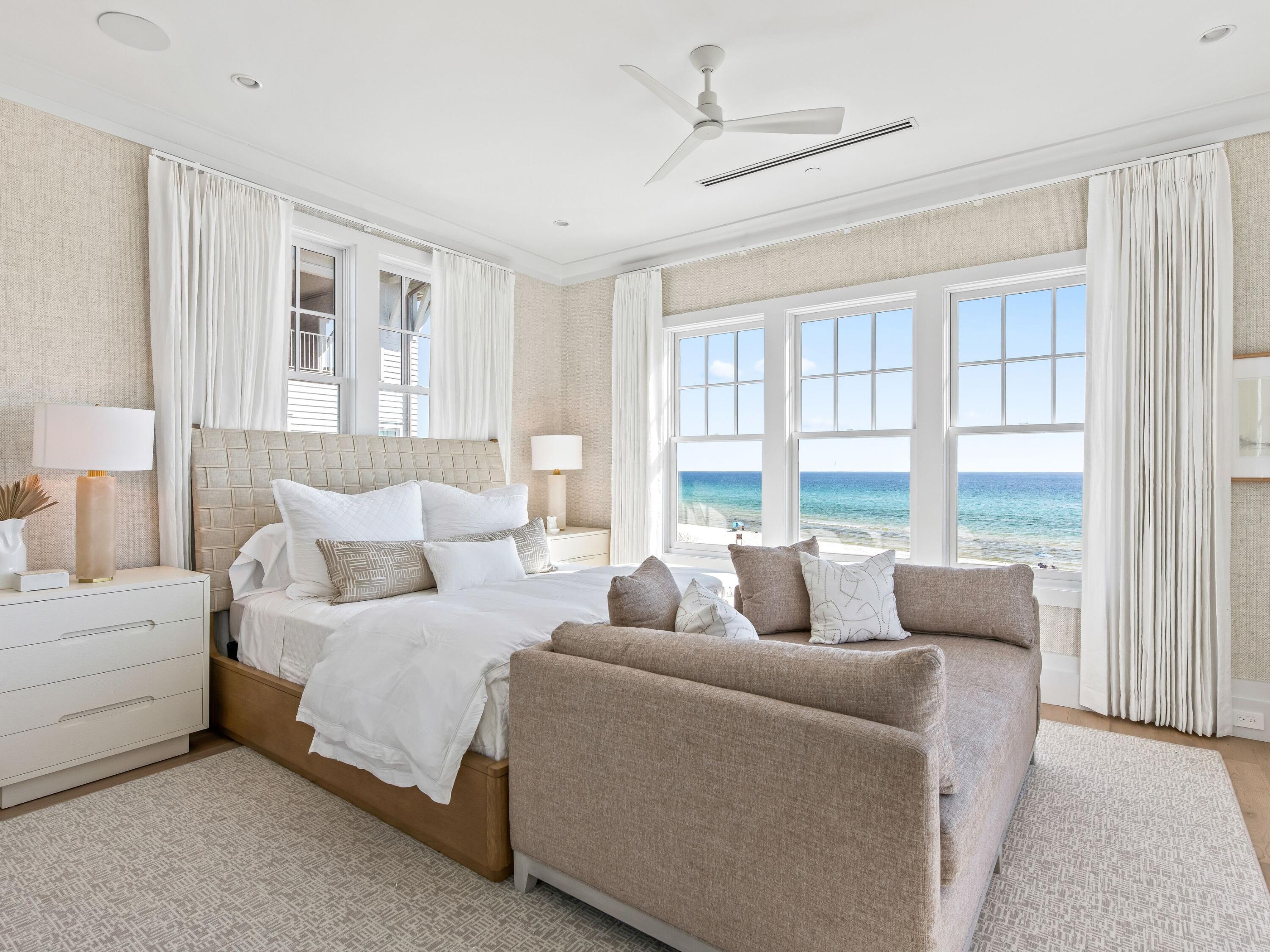 Lot 19 West Lupin Beach Dr Inlet Beach Inlet Beach, FL 32461 - Photo 36 of 57 a bedroom with a bed and glass window