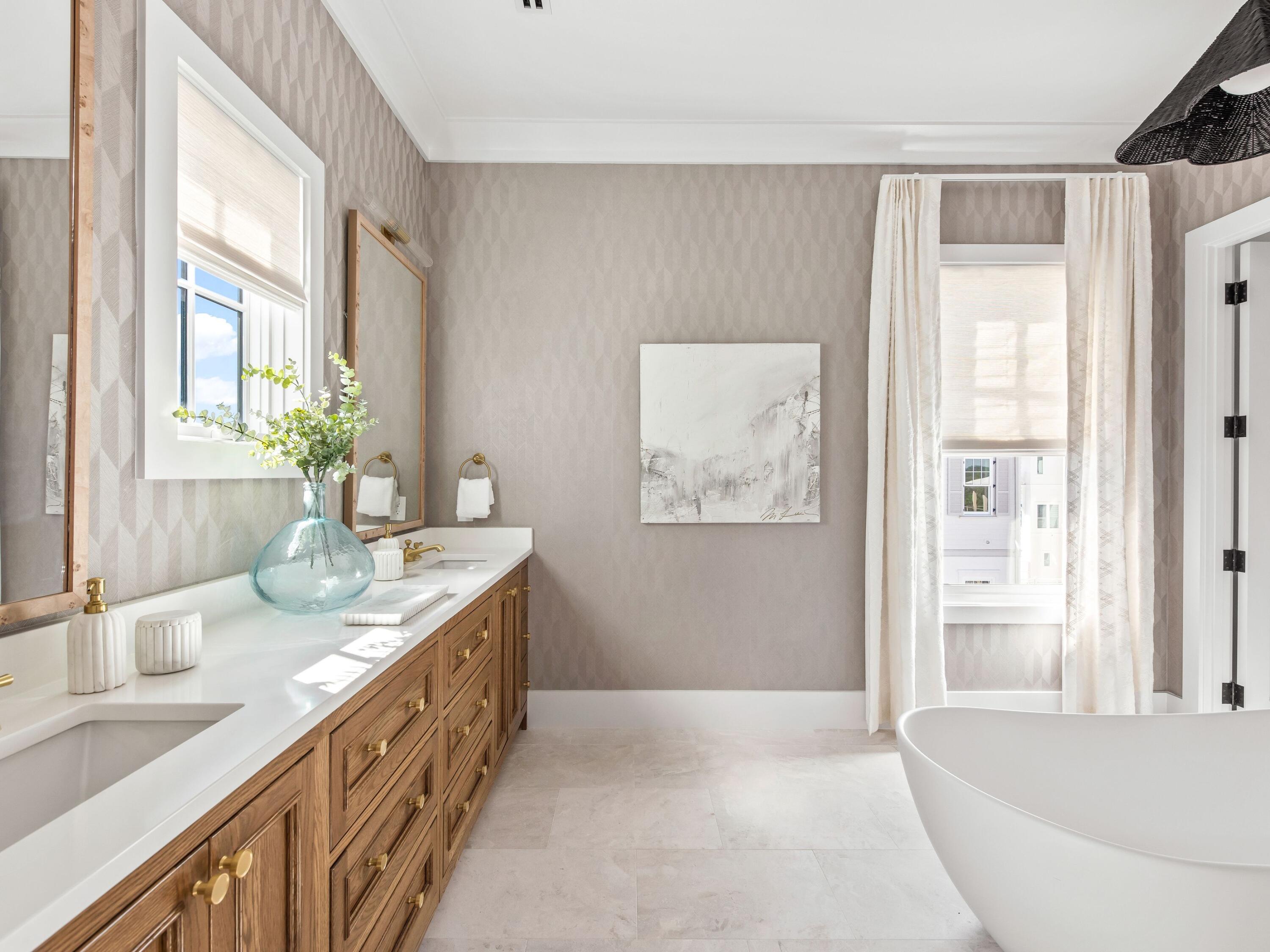 Lot 19 West Lupin Beach Dr Inlet Beach Inlet Beach, FL 32461 - Photo 38 of 57 a bathroom with double vanity sinks a mirror and a bathtub