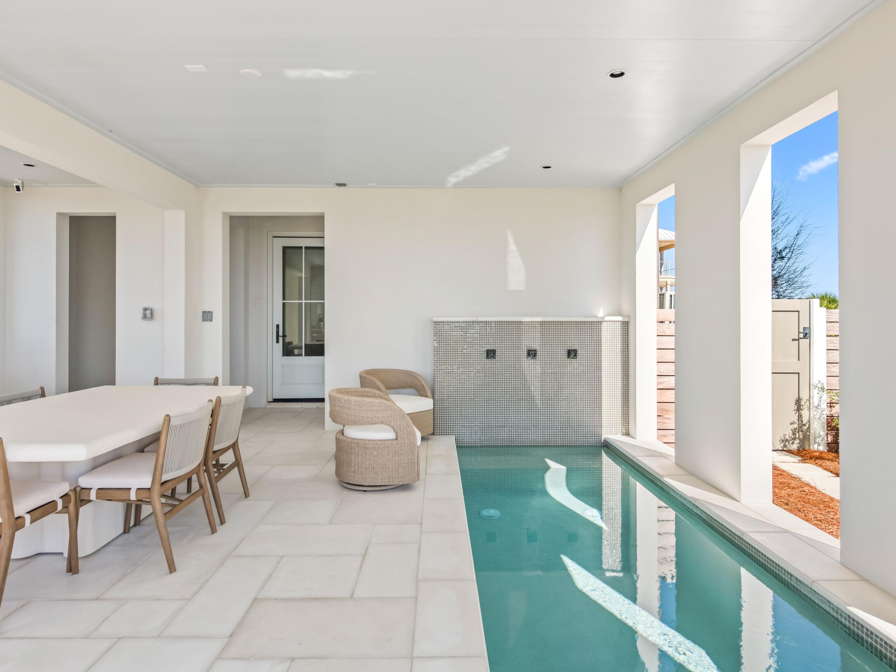 Lot 19 West Lupin Beach Dr Inlet Beach Inlet Beach, FL 32461 - Photo 6 of 57 a living room with furniture and a large window