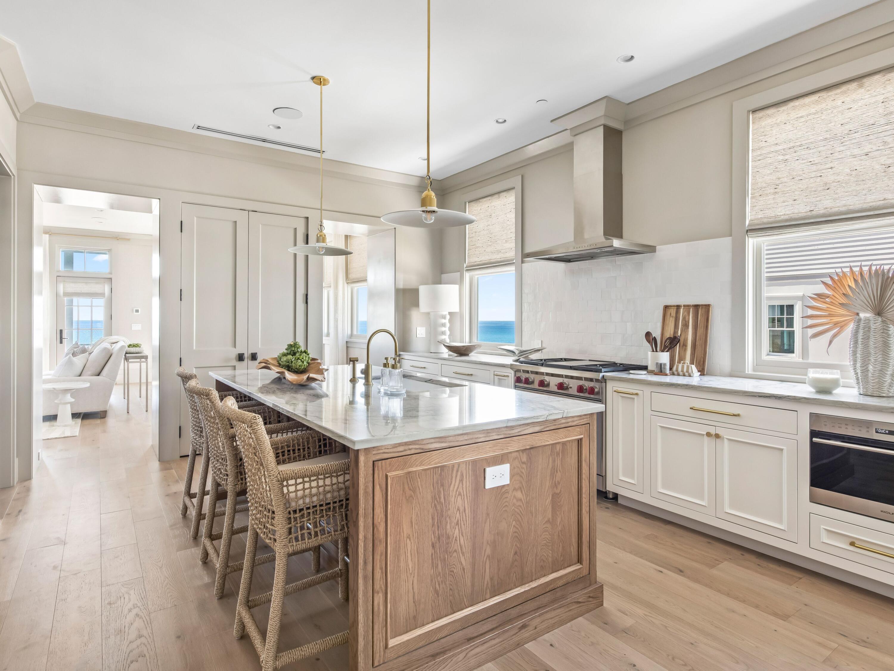 Lot 19 West Lupin Beach Dr Inlet Beach Inlet Beach, FL 32461 - Photo 9 of 57 a kitchen with sink a center island and cabinets