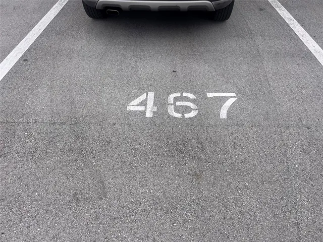 a room with gym equipment and a large window