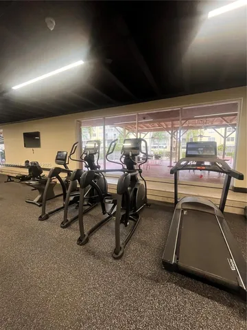 a view of a room with gym equipment