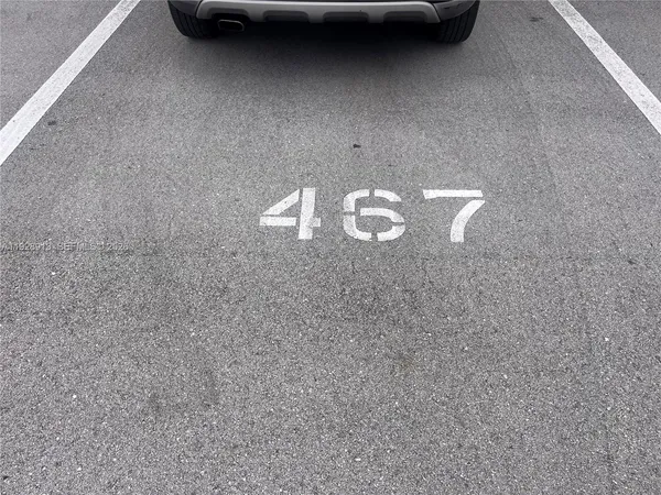 a room with gym equipment and a large window