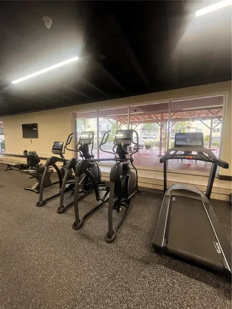 a view of a room with gym equipment