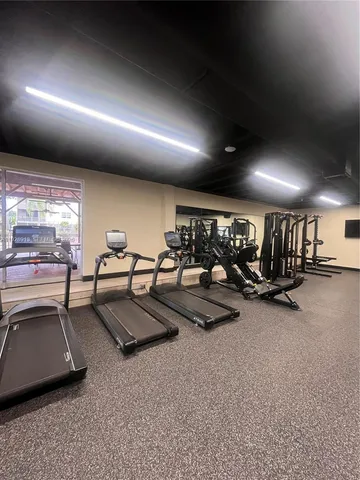 a spacious bathroom with a double vanity sink and a large mirror