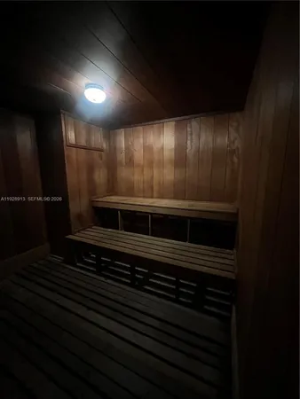 a view of outdoor space with swimming pool and green space