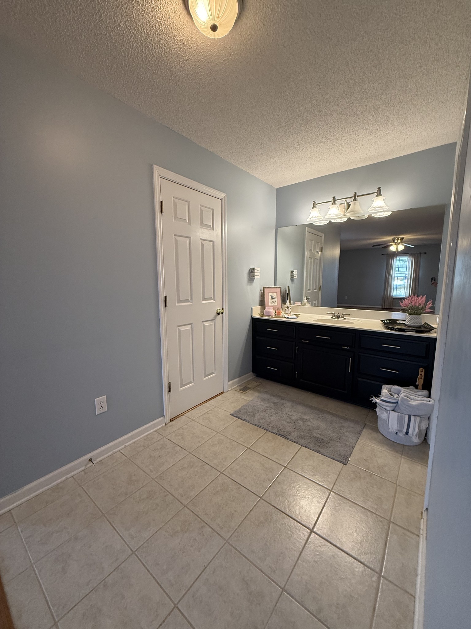 405 Robins Street Lawrenceburg, TN 38464 - Photo 22 of 65 a kitchen with a sink and cabinets