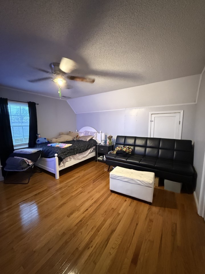 405 Robins Street Lawrenceburg, TN 38464 - Photo 32 of 65 a view of a room with wooden floor and furniture