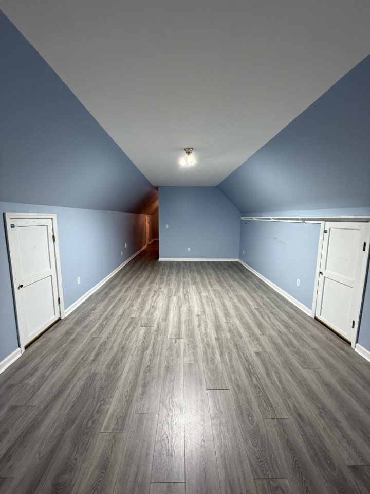 405 Robins Street Lawrenceburg, TN 38464 - Photo 33 of 65 wooden floor in an empty room with wooden floor