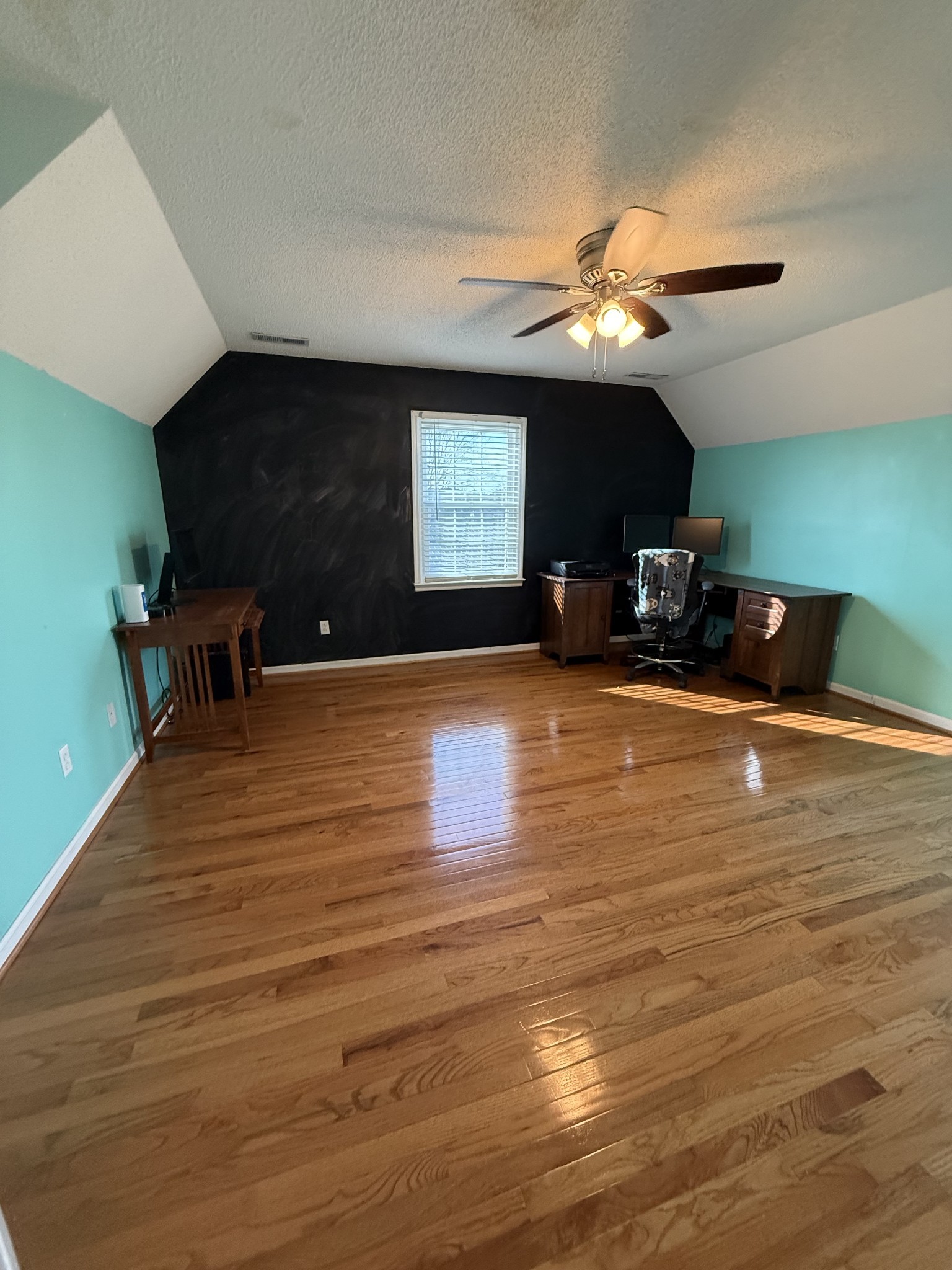 405 Robins Street Lawrenceburg, TN 38464 - Photo 39 of 65 a view of a livingroom with furniture and a ceiling fan