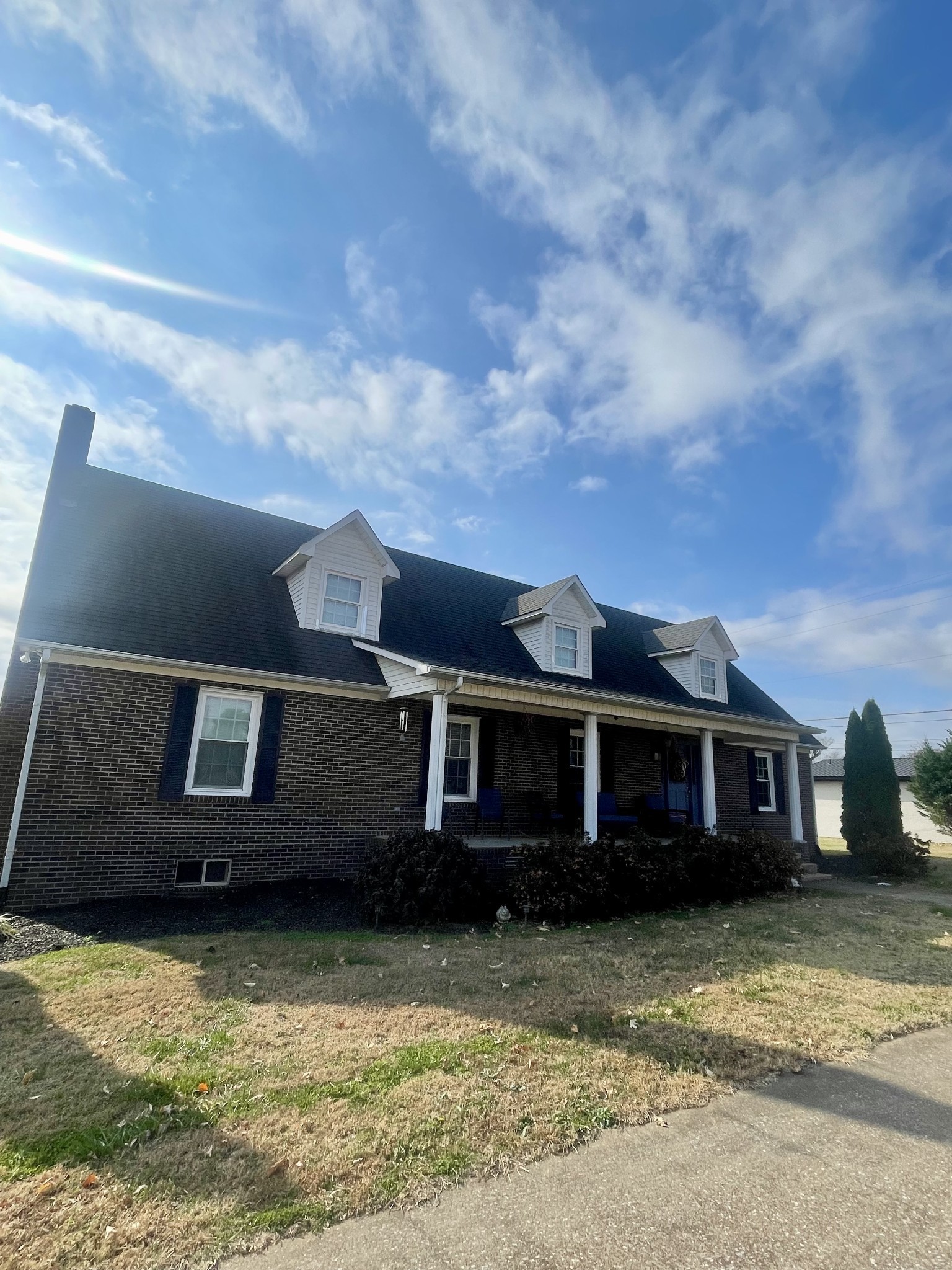 405 Robins Street Lawrenceburg, TN 38464 - Photo 48 of 65 a front view of a house with a yard